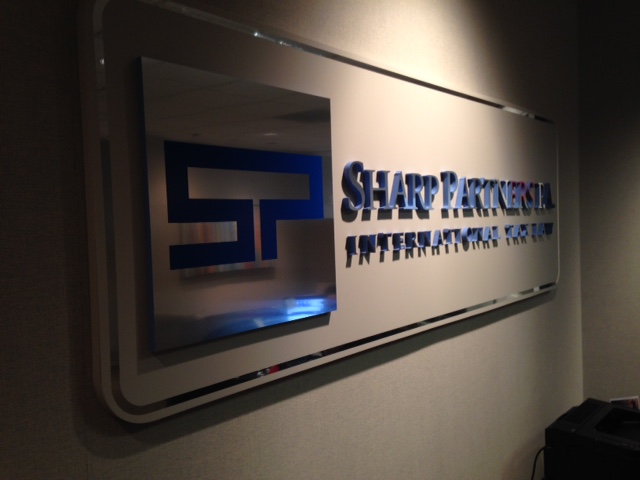 Lobby Signs/Replacing Signs in Tampa, FL for Sharp Partners Tax Law