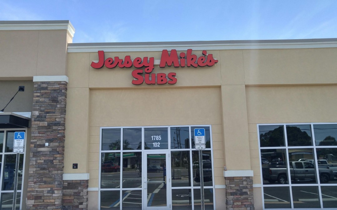 Raceway Mounted Sign in Dunedin, FL for Jersey Mikes